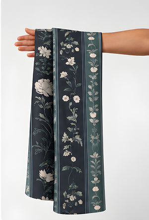 Charcoal Vertical Floral Stripe chiffon held in hand for scale