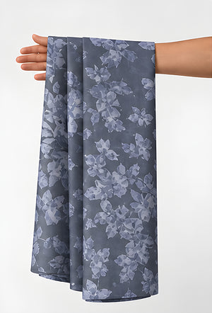 Slate Blue Tonal Botanical chiffon held in hand for scale
