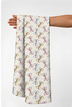 Cream Blue Repeating Motifs silk held in hand for scale