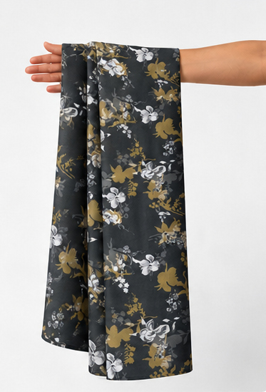 Black Botanical Floral Scatter chiffon held in hand for scale