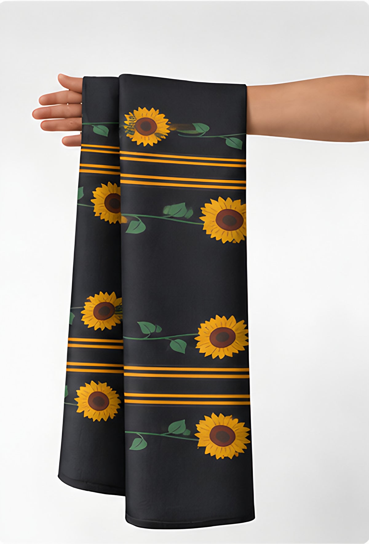 Black Sunflower Stripe chiffon held in hand for scale
