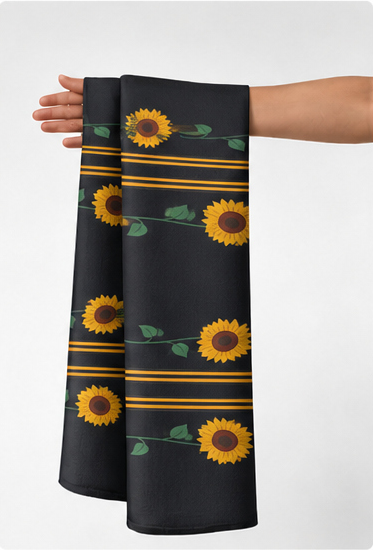 Black Sunflower Stripe chiffon held in hand for scale