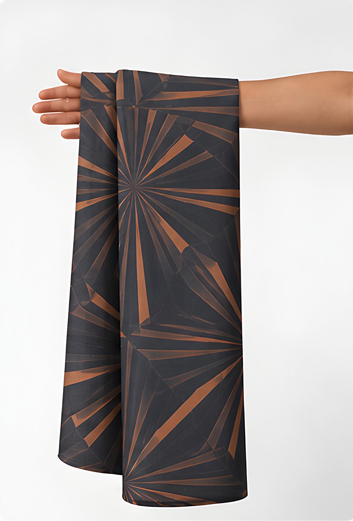 Brown Geometric Starburst chiffon held in hand for scale