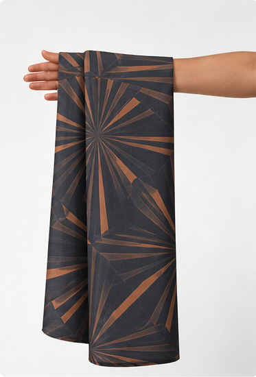 Brown Geometric Starburst chiffon held in hand for scale