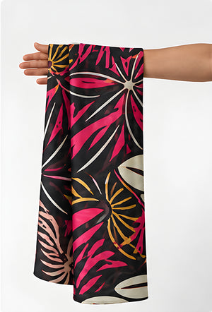 Black Pink Tropical Leaves chiffon held in hand for scale