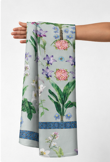 Ivory Pastel Garden Floral chiffon held in hand for scale