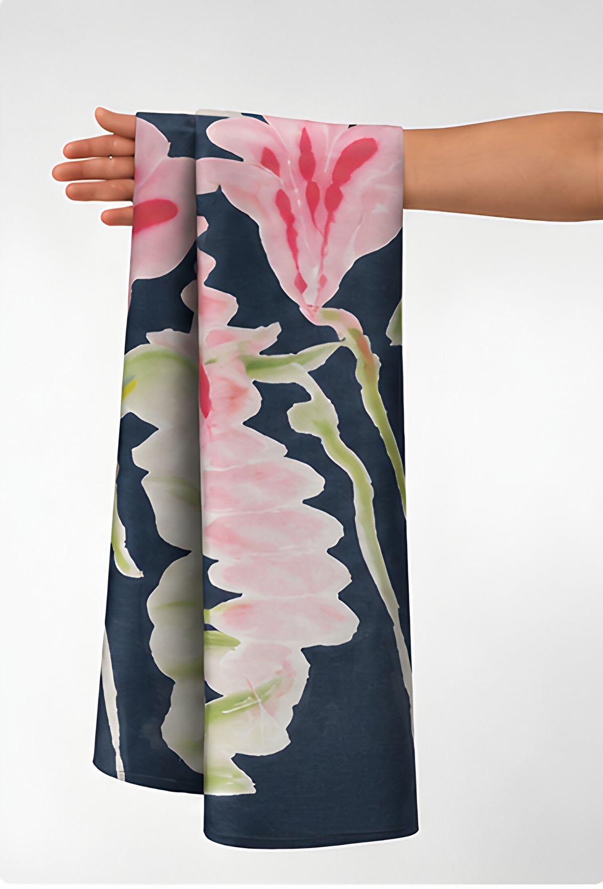 Cream Abstract Tropical Floral chiffon held in hand for scale