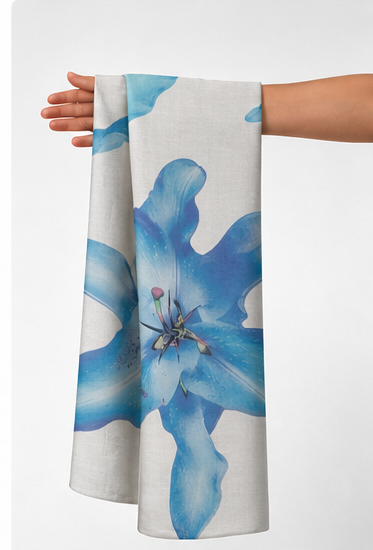 Ivory Blue Lily Print chiffon held in hand for scale