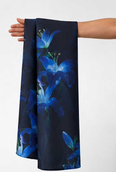 Black Electric Blue Flowers chiffon held in hand for scale