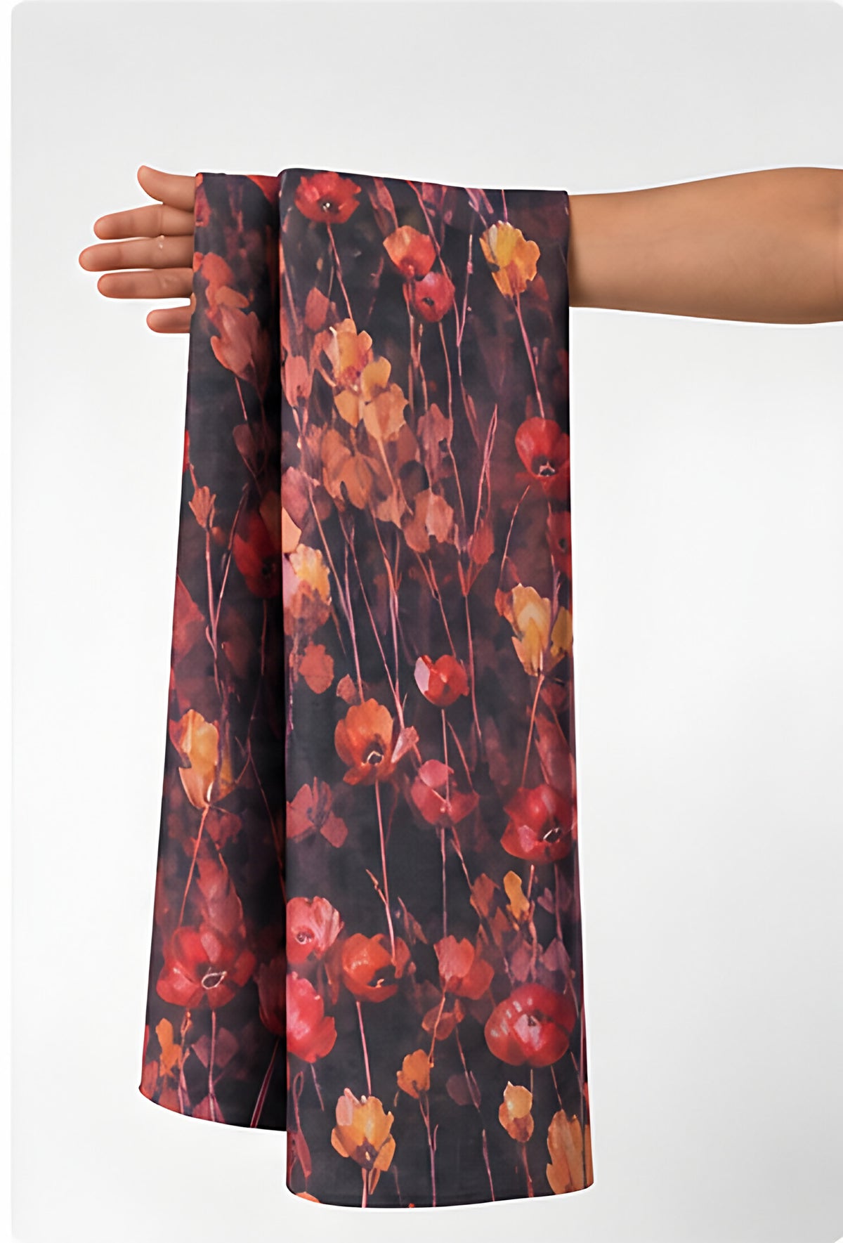 Black Red Wildflower Print chiffon held in hand for scale