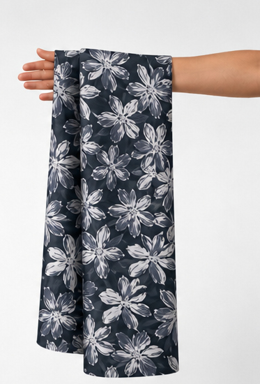 Charcoal White Daisy Garden chiffon held in hand for scale
