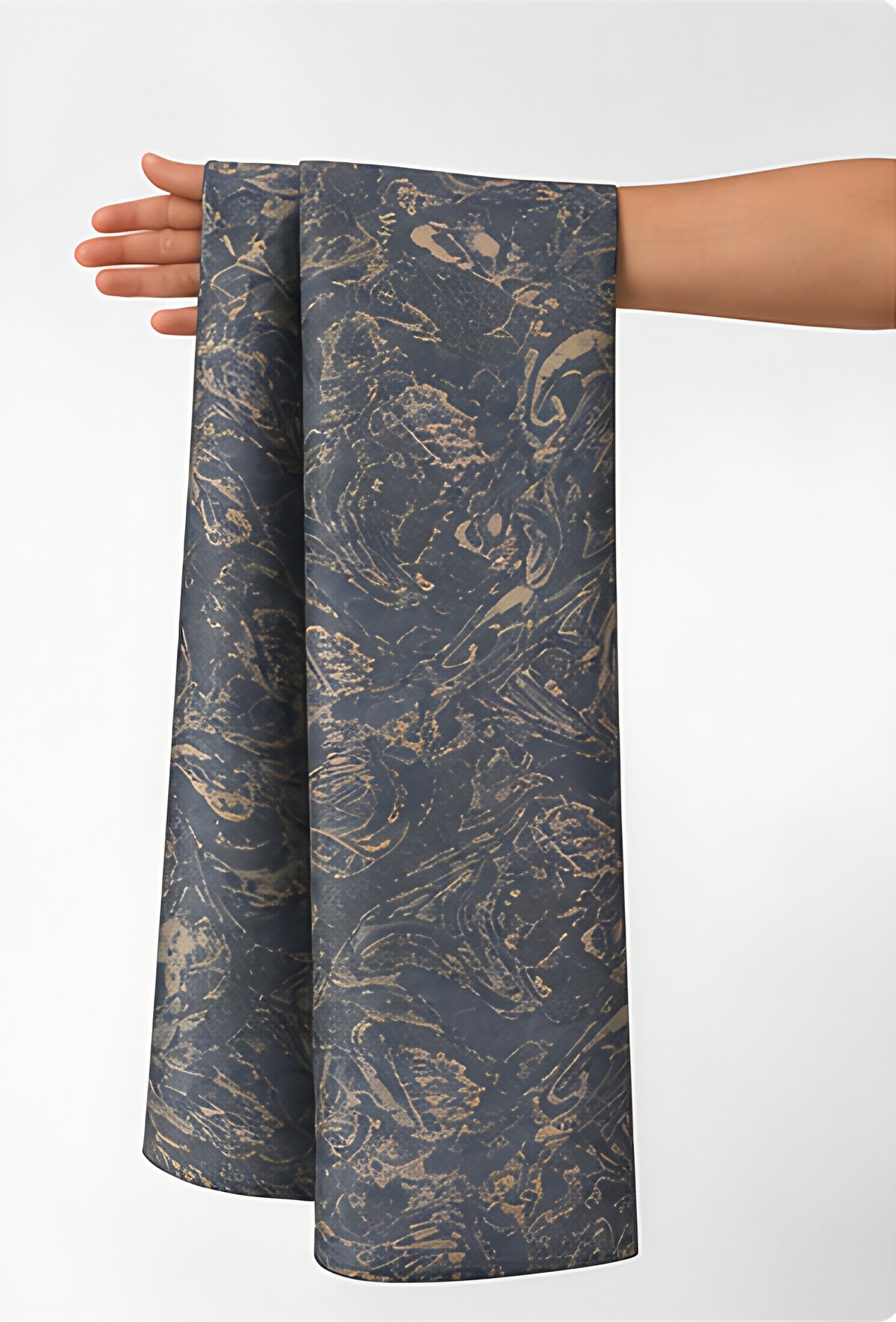 Charcoal Antique Paisley chiffon held in hand for scale