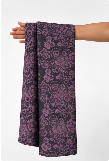 Dusty Plum Ornamental Floral chiffon held in hand for scale