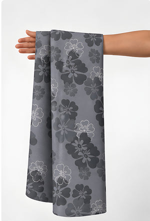 Slate Grey Tonal Floral chiffon held in hand for scale