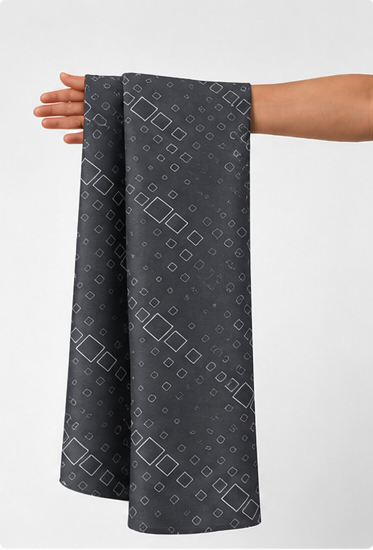Charcoal Subtle Diamond Geometry chiffon held in hand for scale