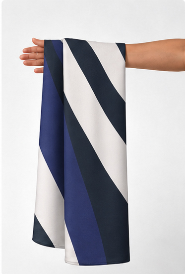 Navy Ivory Curved Stripes crepe held in hand for scale