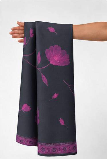 Fuchsia Floral on Charcoal crepe held in hand for scale