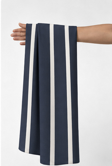 Classic Navy Ivory Pinstripes crepe held in hand for scale