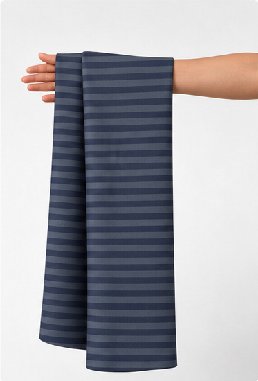 Slate Blue Tonal Stripes crepe held in hand for scale