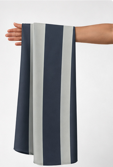 Navy Grey Broad Stripes crepe held in hand for scale