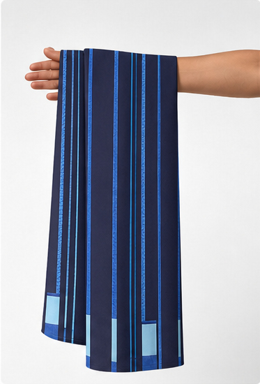Electric Blue Linear Geometry crepe held in hand for scale