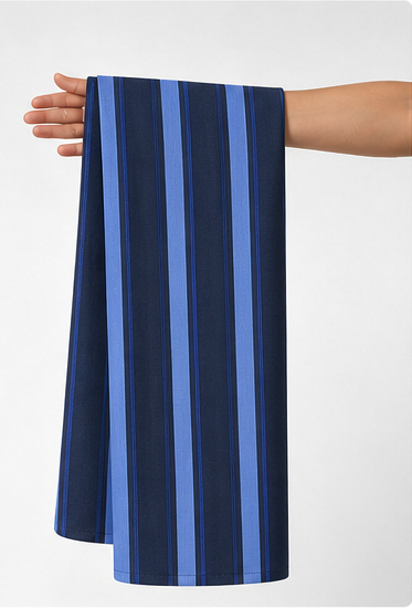 Blue Multitone Vertical Stripes crepe held in hand for scale