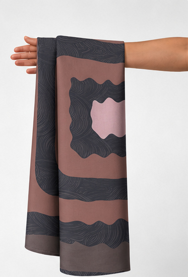 Dusty Rose Layered Squares crepe held in hand for scale