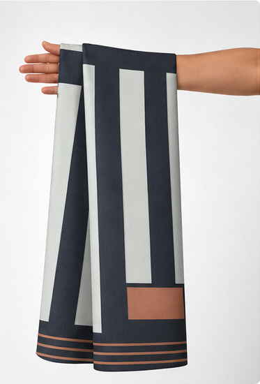 Navy Ivory Modern Geometry crepe held in hand for scale