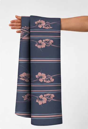 Navy Rose Floral Stripe crepe held in hand for scale