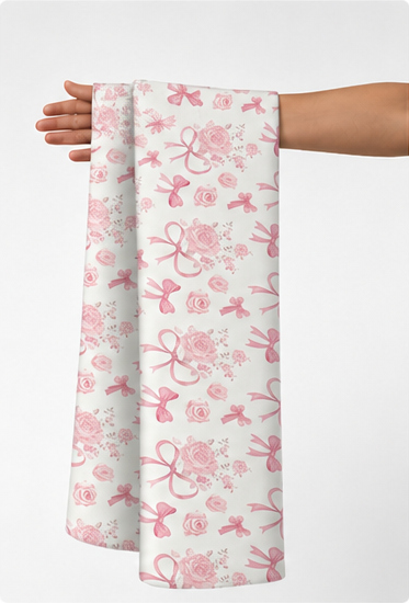 Soft Pink Floral Bows poly-cotton held in hand for scale