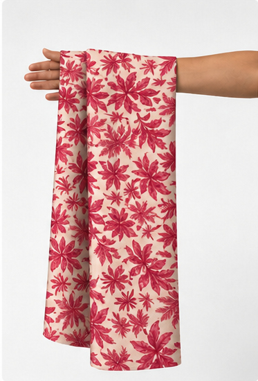 Raspberry Red Tropical Foliage poly-cotton held in hand for scale