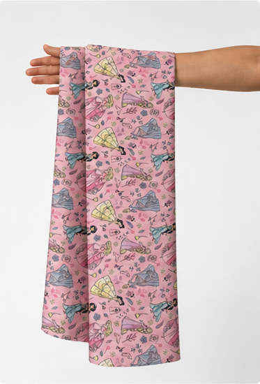 Pink Whimsical Garden poly-cotton held in hand for scale