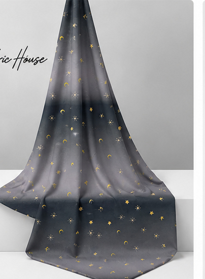 Charcoal Golden Star Dust poly-cotton draped to show fall