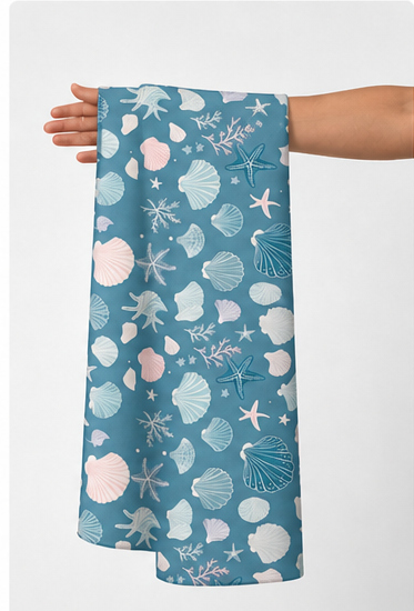 Teal White Celestial Shapes poly-cotton held in hand for scale