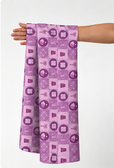 Purple Retro Patchwork poly-cotton held in hand for scale
