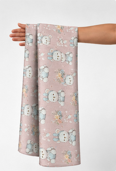 Blush Pink Mini Floral Tiles poly-cotton held in hand for scale