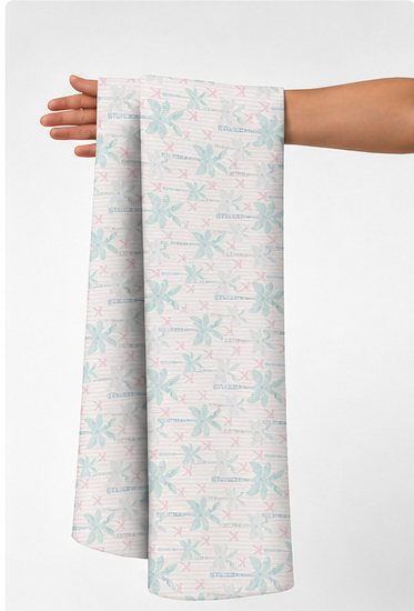 Ivory Mint Delicate Branches poly-cotton held in hand for scale