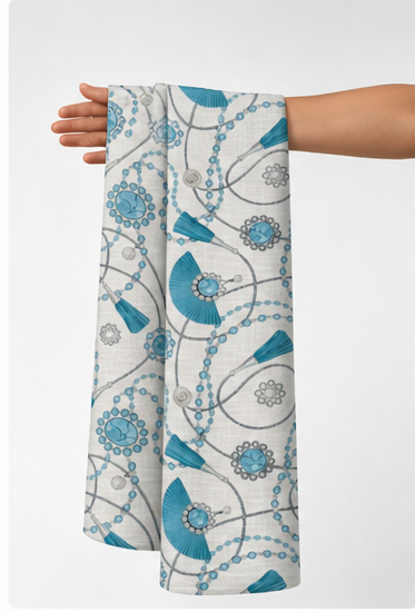 Turquoise Botanical Line Art poly-cotton held in hand for scale