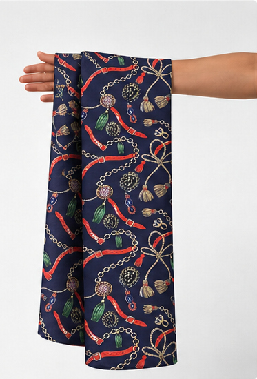 Navy Multicolor Swirl Print poly-cotton held in hand for scale