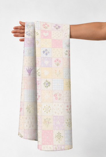 Cream Pastel Patchwork Illustrations poly-cotton held in hand for scale