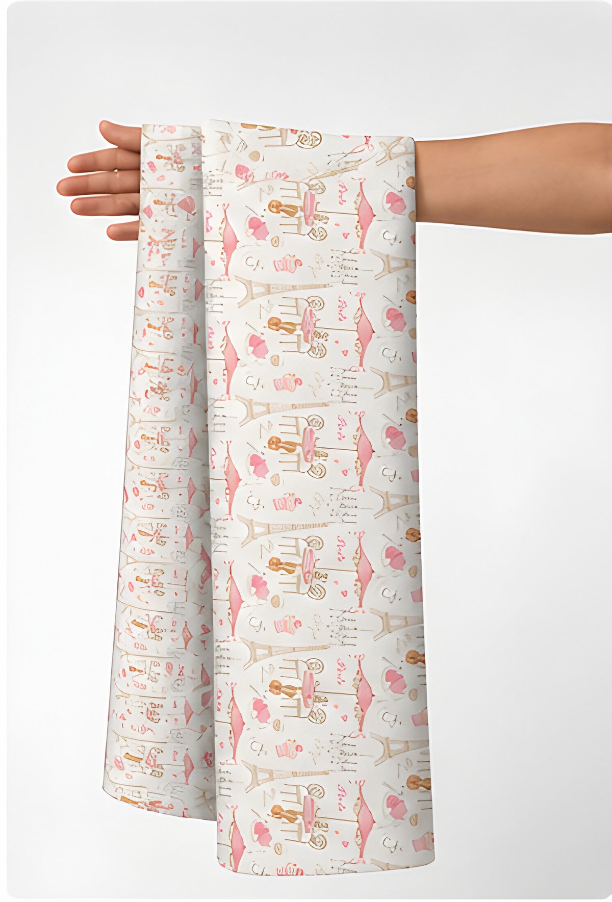 Cream Pink Illustrated Patchwork poly-cotton held in hand for scale