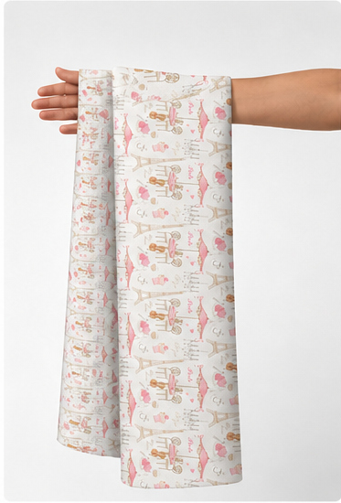 Cream Pink Illustrated Patchwork poly-cotton held in hand for scale