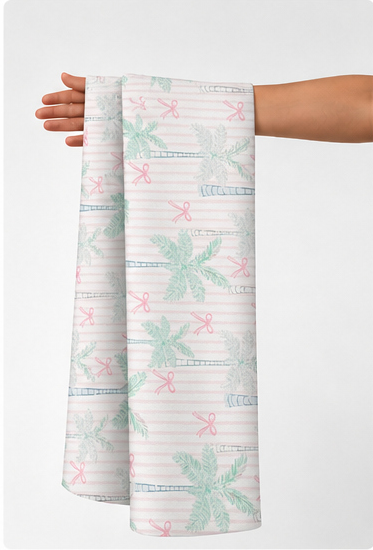 Mint Pink Tropical Leaves poly-cotton held in hand for scale