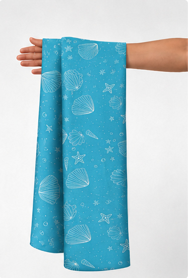 Azure Blue Delicate Motifs silk held in hand for scale