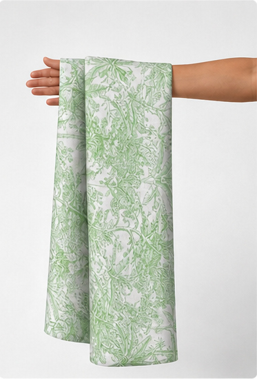 Sage Green Botanical silk held in hand for scale
