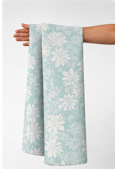 Pale Aqua Floral Lace silk held in hand for scale