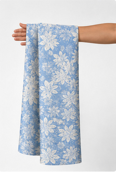 Powder Blue Floral Lace silk held in hand for scale