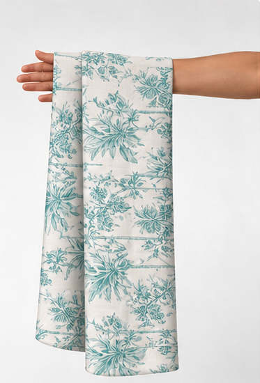 Teal Botanical Toile silk held in hand for scale
