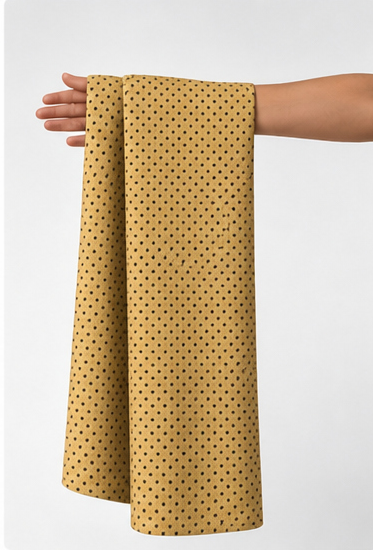 Golden Mustard Micro Texture silk held in hand for scale