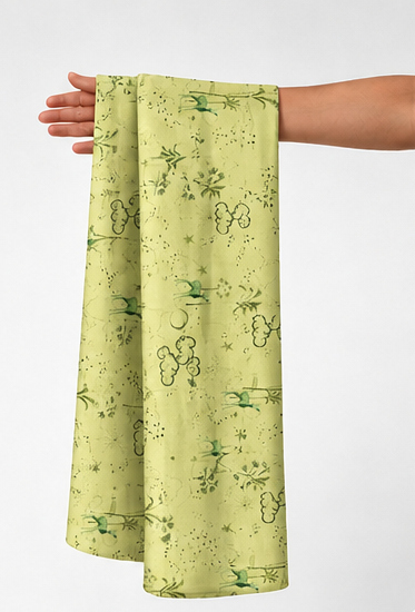 Lime Green Botanical Print silk held in hand for scale